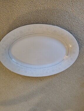 Elegant White SeaGull Porcelain Oval Serving Platter with Silver Trim.